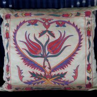 colourful tulip design on cream adras silk body.