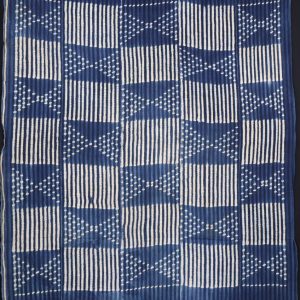 Lovely shades of blue with our selection of African Indigo dyed vintage Mali clothes. Handloomed and tie- resist dyed in Indigo vats with each piece reaching different depths and shades of Indigo blues Versatile pieces which suit being worn as a sarong, scarf or shawl and look striking as wall display, table clothes and picnic clothes. Please note these are vintage items and can have some wear and small repairs ( see pic) 155cm x 115cm