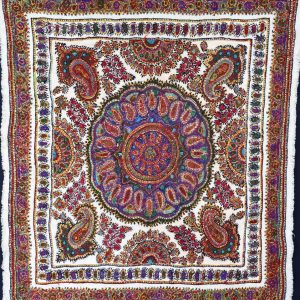 floral design with colourful botehs and petals around a central medallion