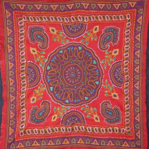 floral design with colourful botehs and petals around a central medallion