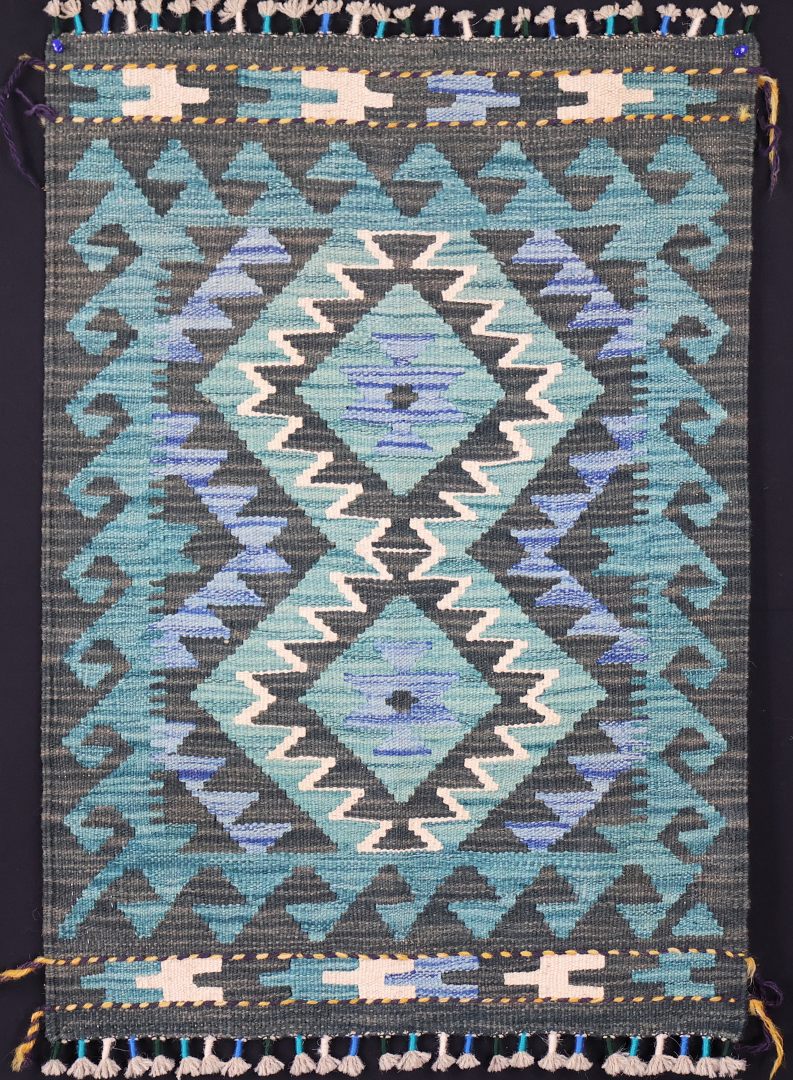 Multicolour Natural‑Dye Kilims • Dyed with pigments from fruits, vegetables, and spices. • Often brighter, with a more contemporary feel. • Typically woven in northern Afghanistan using Ghazni wool.