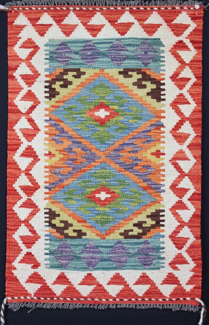 Multicolour Natural‑Dye Kilims • Dyed with pigments from fruits, vegetables, and spices. • Often brighter, with a more contemporary feel. • Typically woven in northern Afghanistan using Ghazni wool.