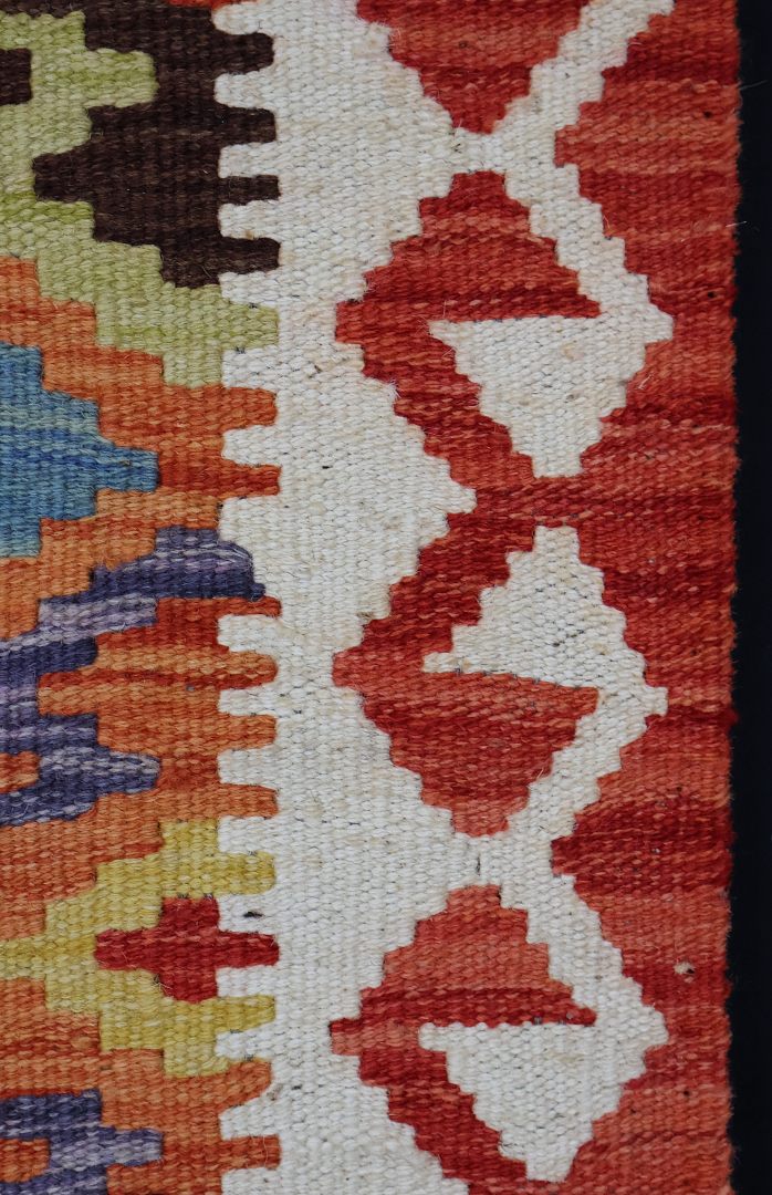 Multicolour Natural‑Dye Kilims • Dyed with pigments from fruits, vegetables, and spices. • Often brighter, with a more contemporary feel. • Typically woven in northern Afghanistan using Ghazni wool.