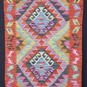 Multicolour Natural‑Dye Kilims • Dyed with pigments from fruits, vegetables, and spices. • Often brighter, with a more contemporary feel. • Typically woven in northern Afghanistan using Ghazni wool.