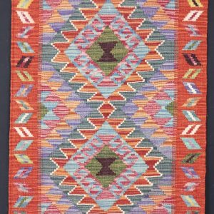Multicolour Natural‑Dye Kilims • Dyed with pigments from fruits, vegetables, and spices. • Often brighter, with a more contemporary feel. • Typically woven in northern Afghanistan using Ghazni wool.