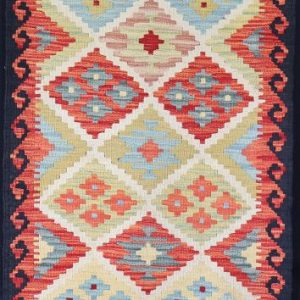 Colourful geometric designed flatweave rug