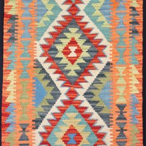 Colourful geometric designed flatweave rug