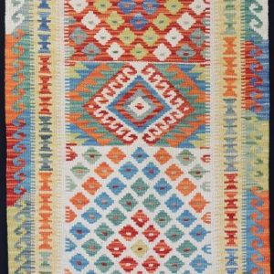 Colourful geometric designed flatweave rug
