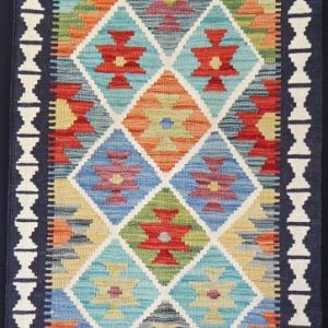 Colourful geometric designed flatweave rug