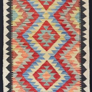 Colourful geometric designed flatweave rug