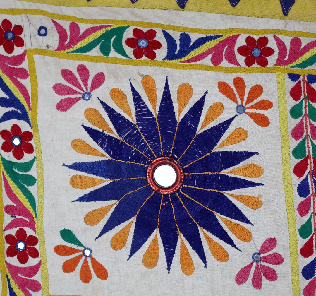 Colourful floral patterned quilt design