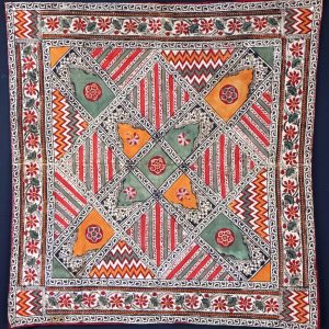 Colourful patterned textile with geometric design