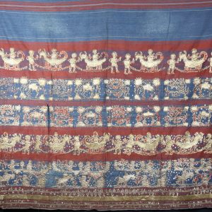 Colourful traditional textile with gold design patterns