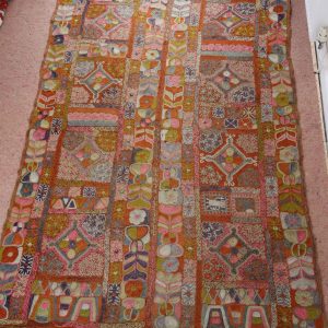 Colourful patterned textile with intricate designs