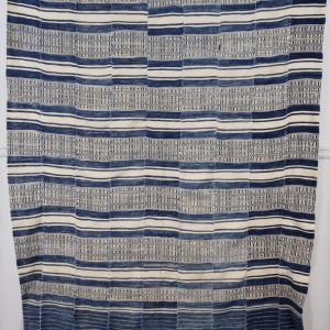 Traditional woven textile with patterns.