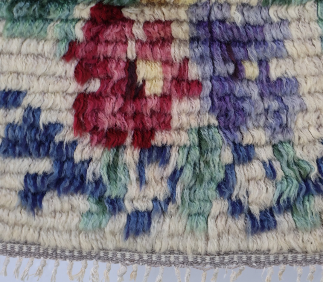 Floral patterned woven rug