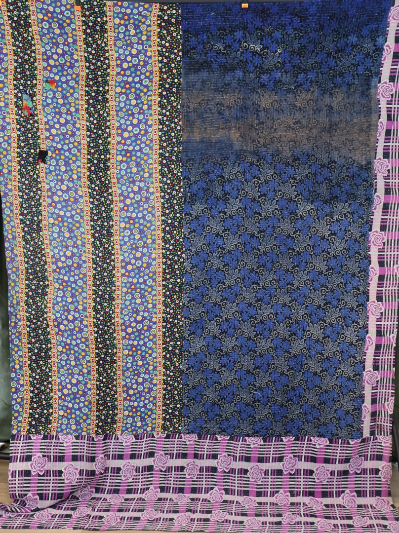 Colourful patterned fabric with floral designs.