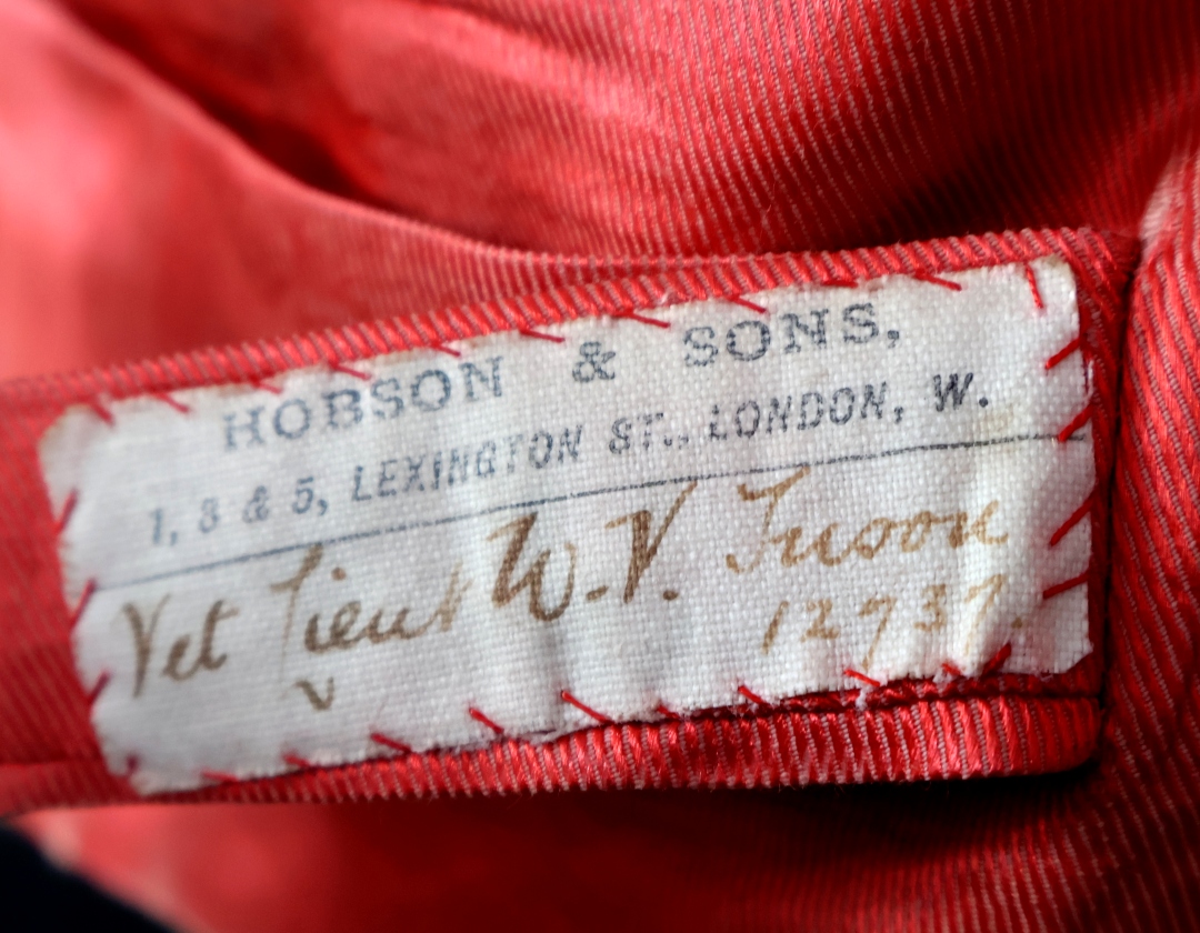 Red embroidered garment with ornate details