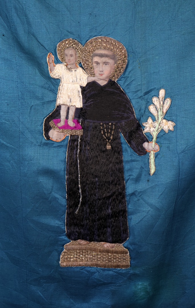 Embroidered banner with religious imagery