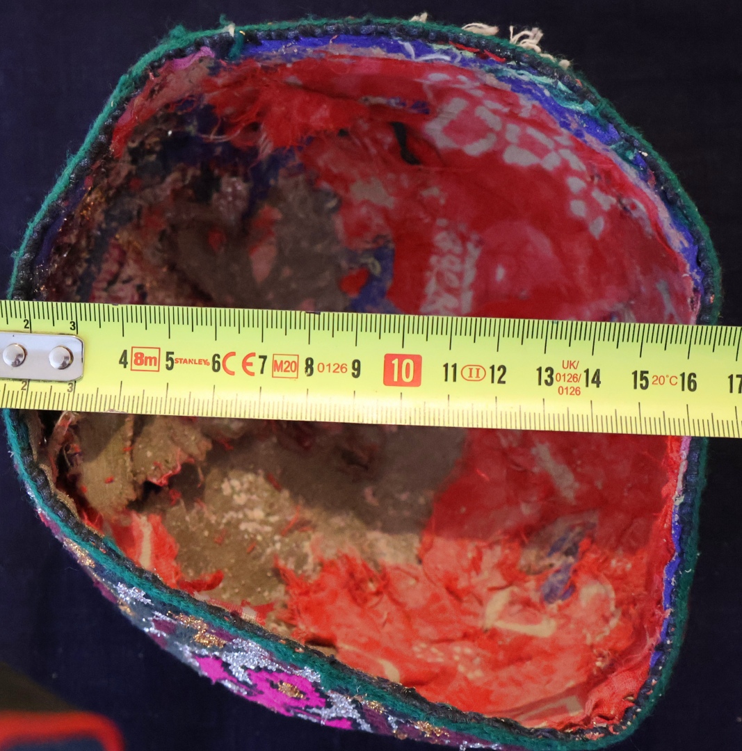 Colourful hat with measuring tape