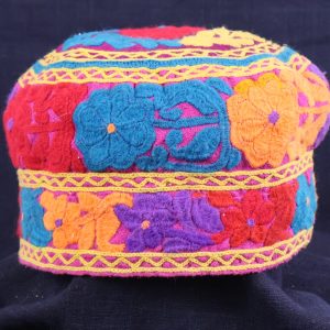 brightly coloured embroidered tribal hat